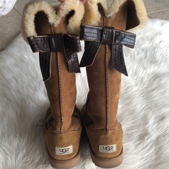 UGG Shoes - Beautiful Ugg’s with leather bows on the back